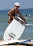 Heather Locklear Learns to Surf in a Bikini