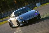 th_54887_Porsche_997_GT2_gris_piste_face_122_1153lo.jpg