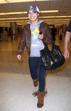 th_70247_Preppie_-_Hayden_Panettiere_arriving_at_Miami_International_Airport_-_Dec._31_2009_1323_122_356lo.jpg