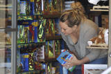 th_15766_Preppie_Hilary_Duff_shops_for_toys_before_grabbing_some_freshly_prepared_coconut_2_122_486lo.jpg